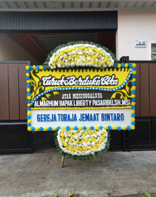Papan Bunga Duka di Saringan