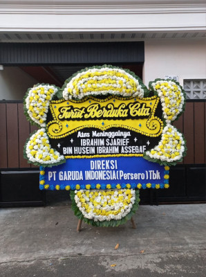 Papan Bunga Duka di Saringan
