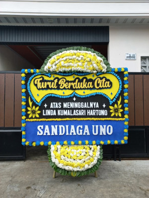 Papan Bunga Duka di Saringan